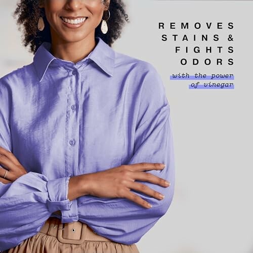 Smiling person in a purple shirt with text about stain and odor removal using vinegar.